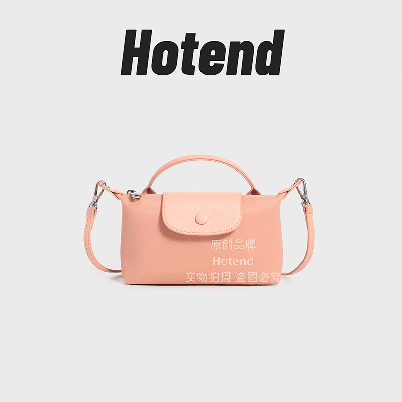 Small solid-color dumpling bag in cherry blossom pink